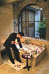 A hotel butler drawing a custom bath at Hotel Monasterio, Peru.