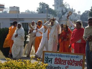 People outdoors worshipping.